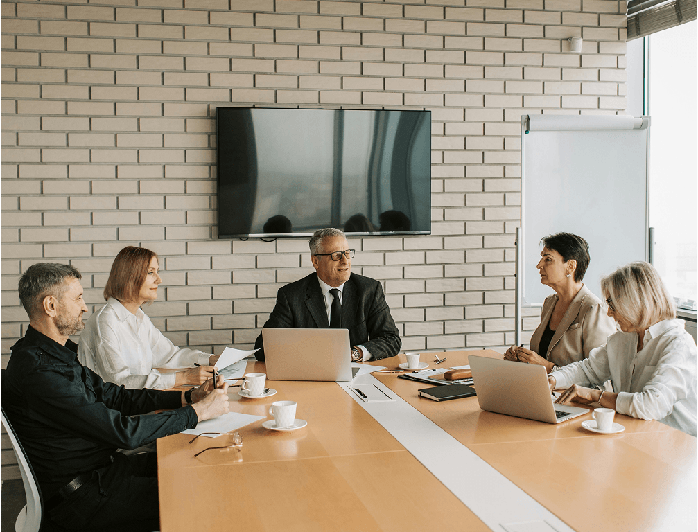 Office colleagues in a business meeting discussing strategy.